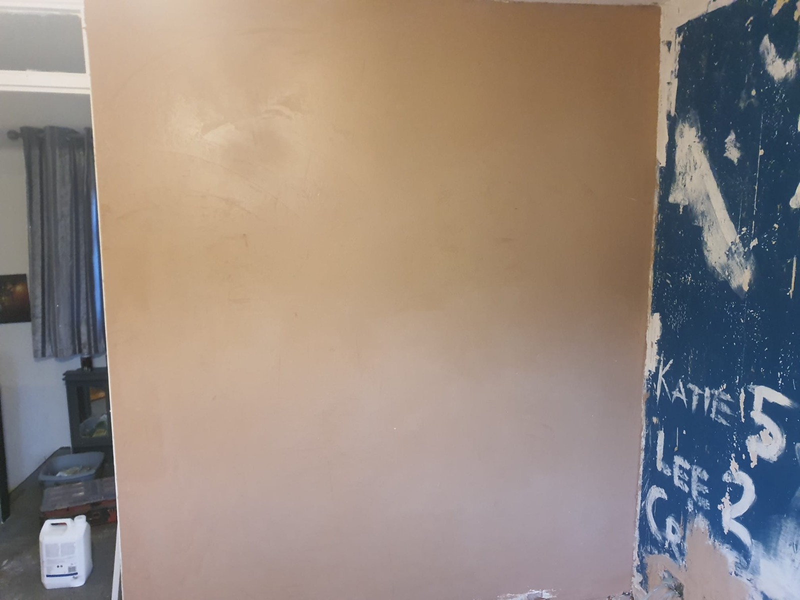 Newly skimmed plaster wall drying out — Cwmbran property refurbishment