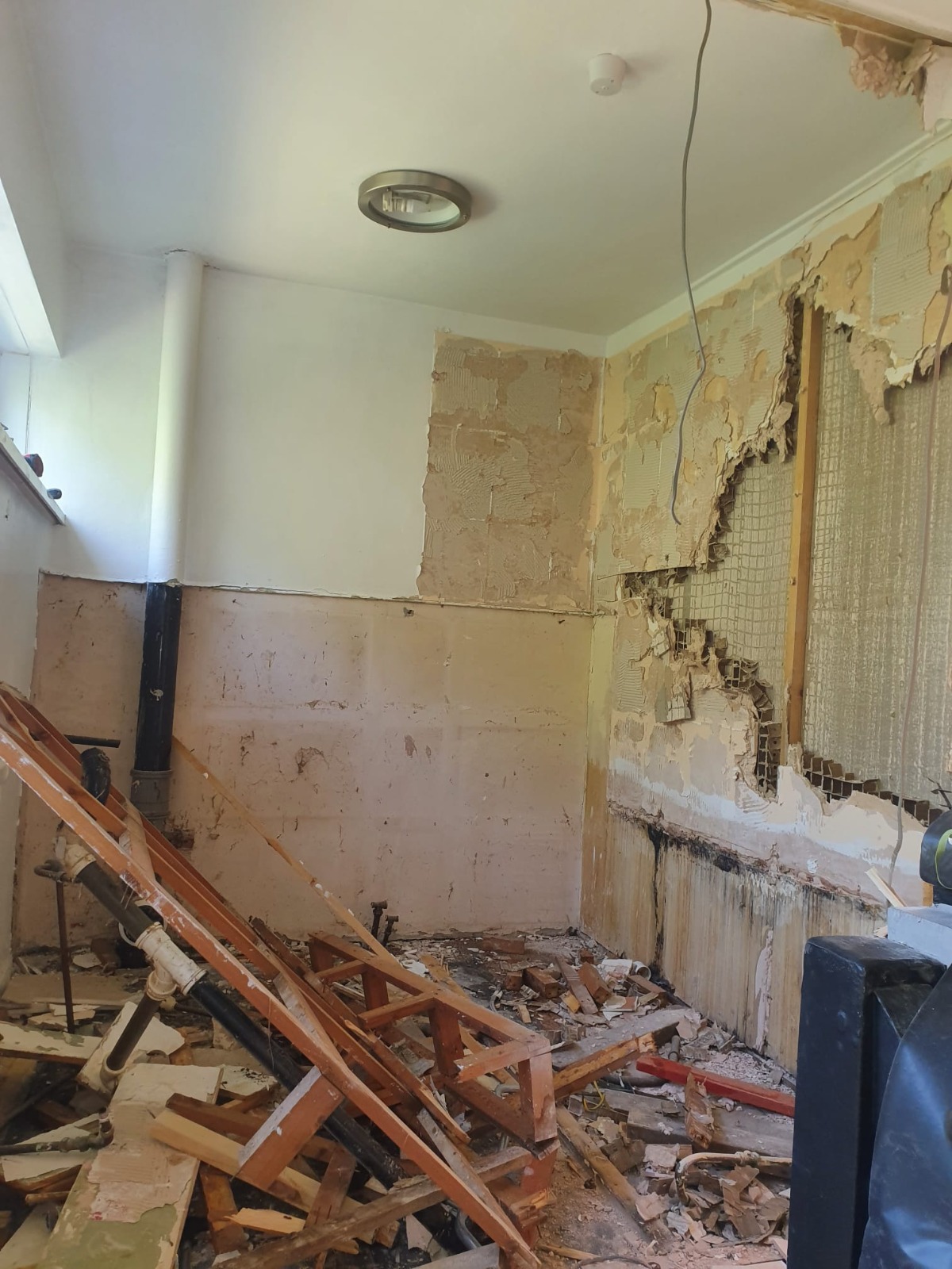 Kitchen strip-out and debris clearance — full refurbishment, Newport
