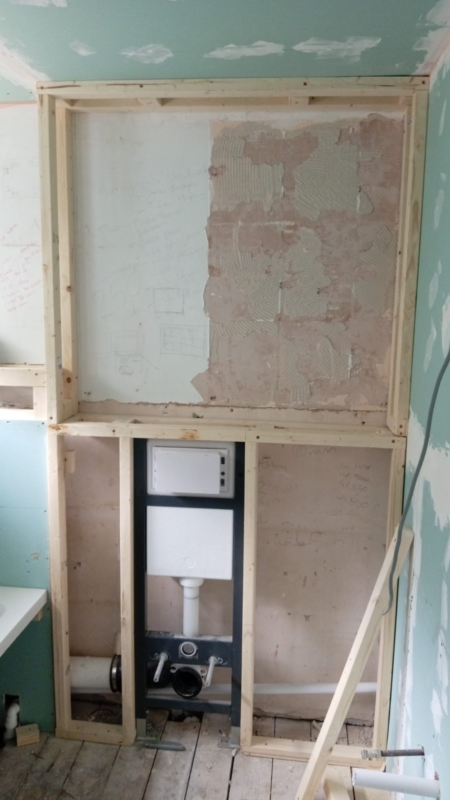 Concealed cistern frame fitted for wall-hung WC — South Wales bathroom